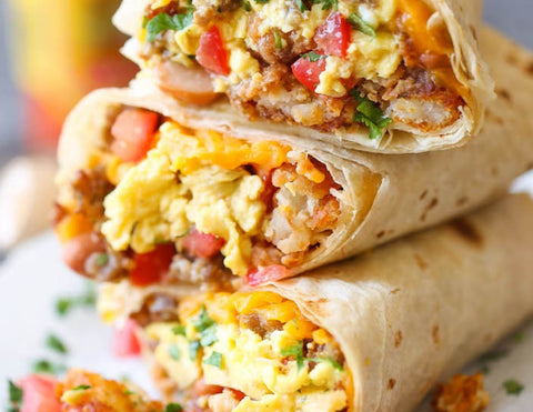 Breakfast Burrito - Loaded with tater tots, sausage, eggs, veggies and cheese. *Mixed Fruit on the side - Fresh 'N Tasty - Naples Meal Prep